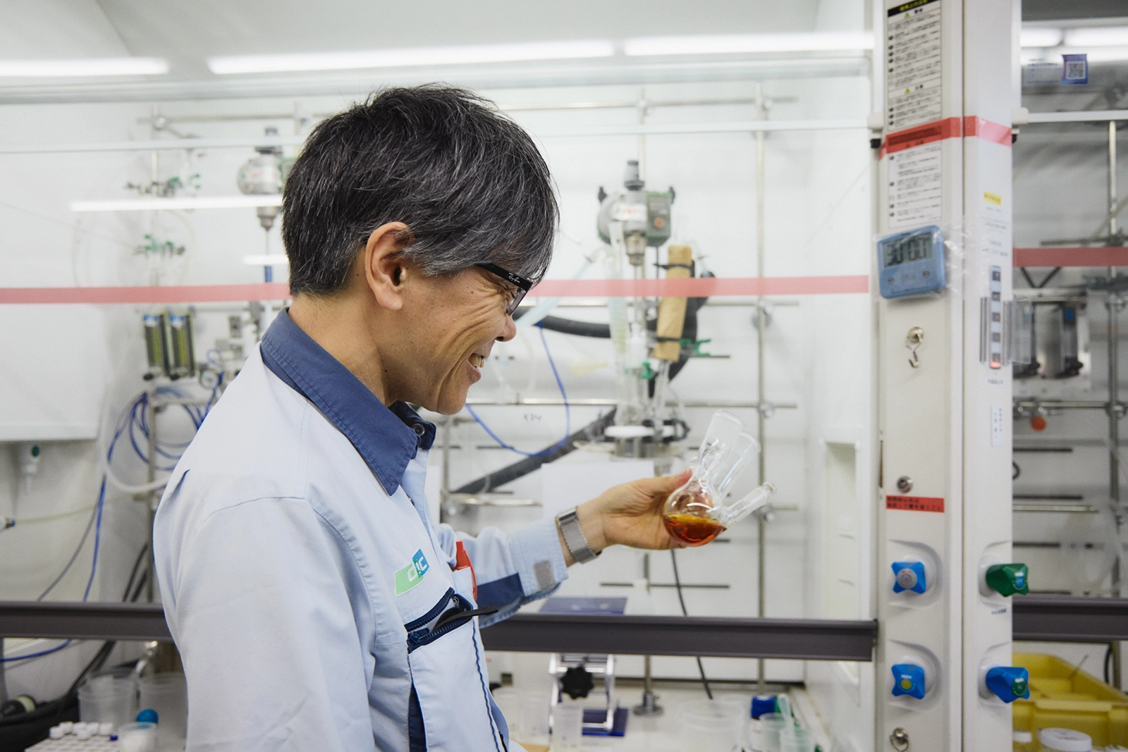 Examining a sample of an active ester epoxy resin curing agent in the laboratory