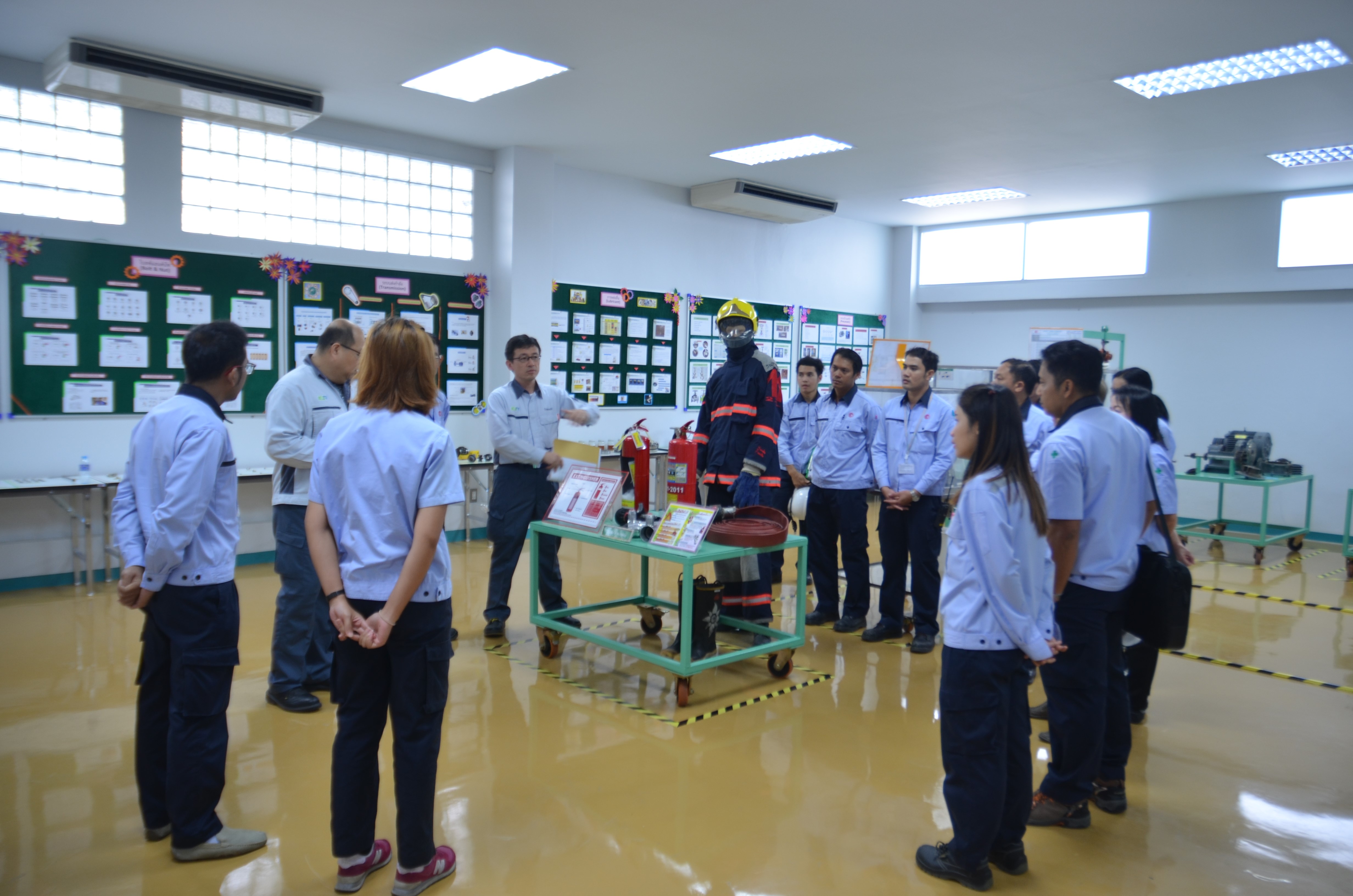 Employees participate in hands-on safety training at Siam Chemical Industry